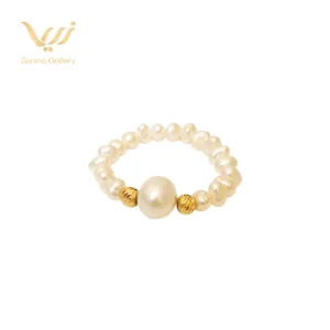 انگشتر مروارید و دو گوی طلا