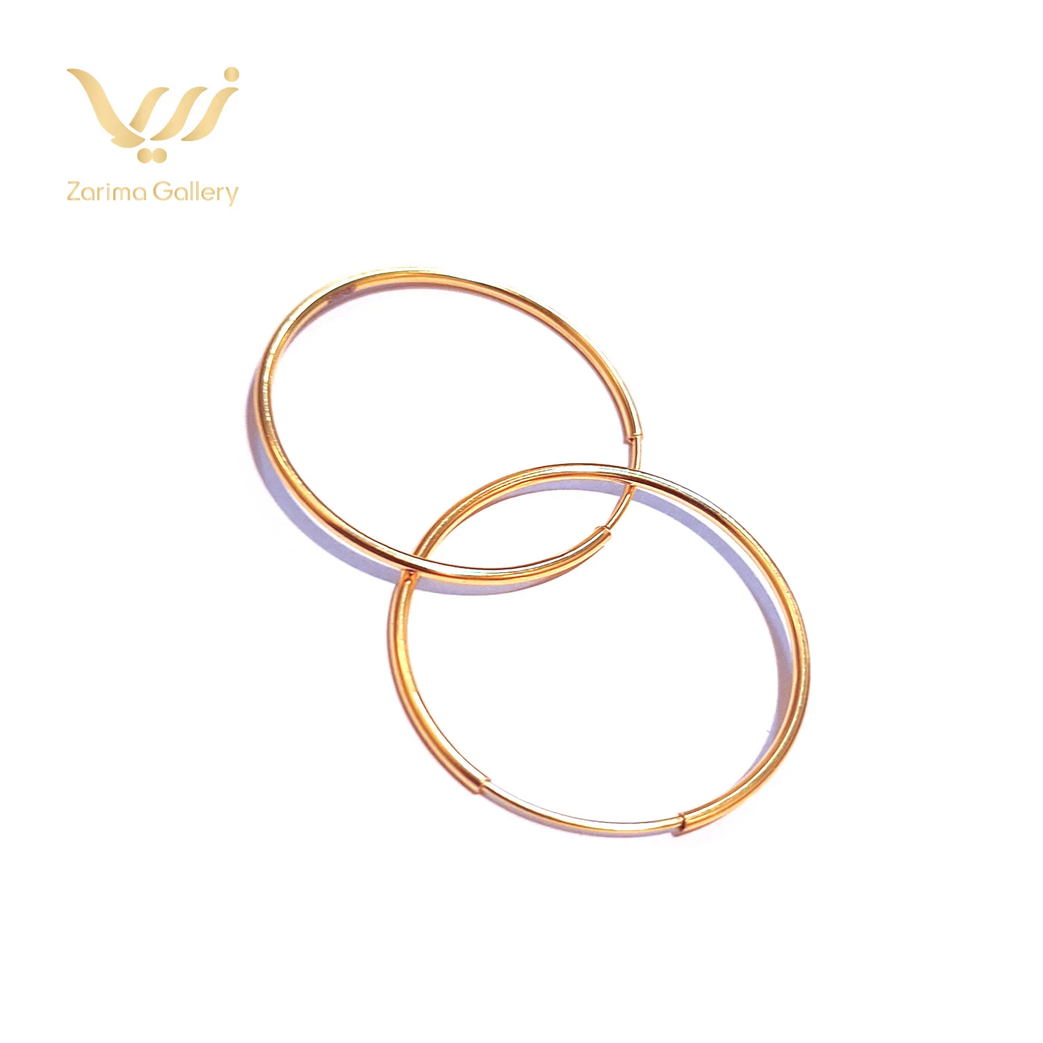 گوشواره طلا بزرگ حلقه ای ساده 1 گوشواره طلا بزرگ حلقه ای ساده
