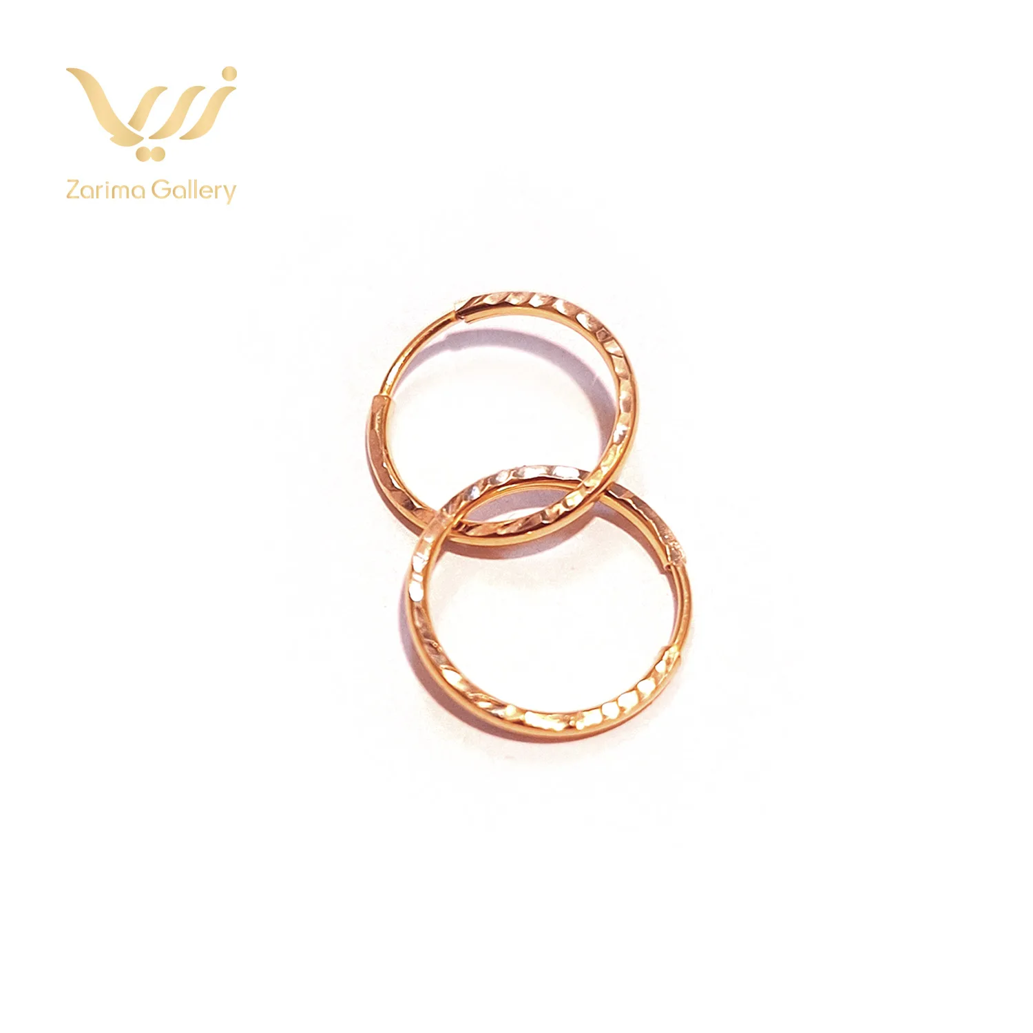 گوشواره طلا حلقه ای تراش دار کوچک 1 گوشواره طلا حلقه ای تراش دار کوچک